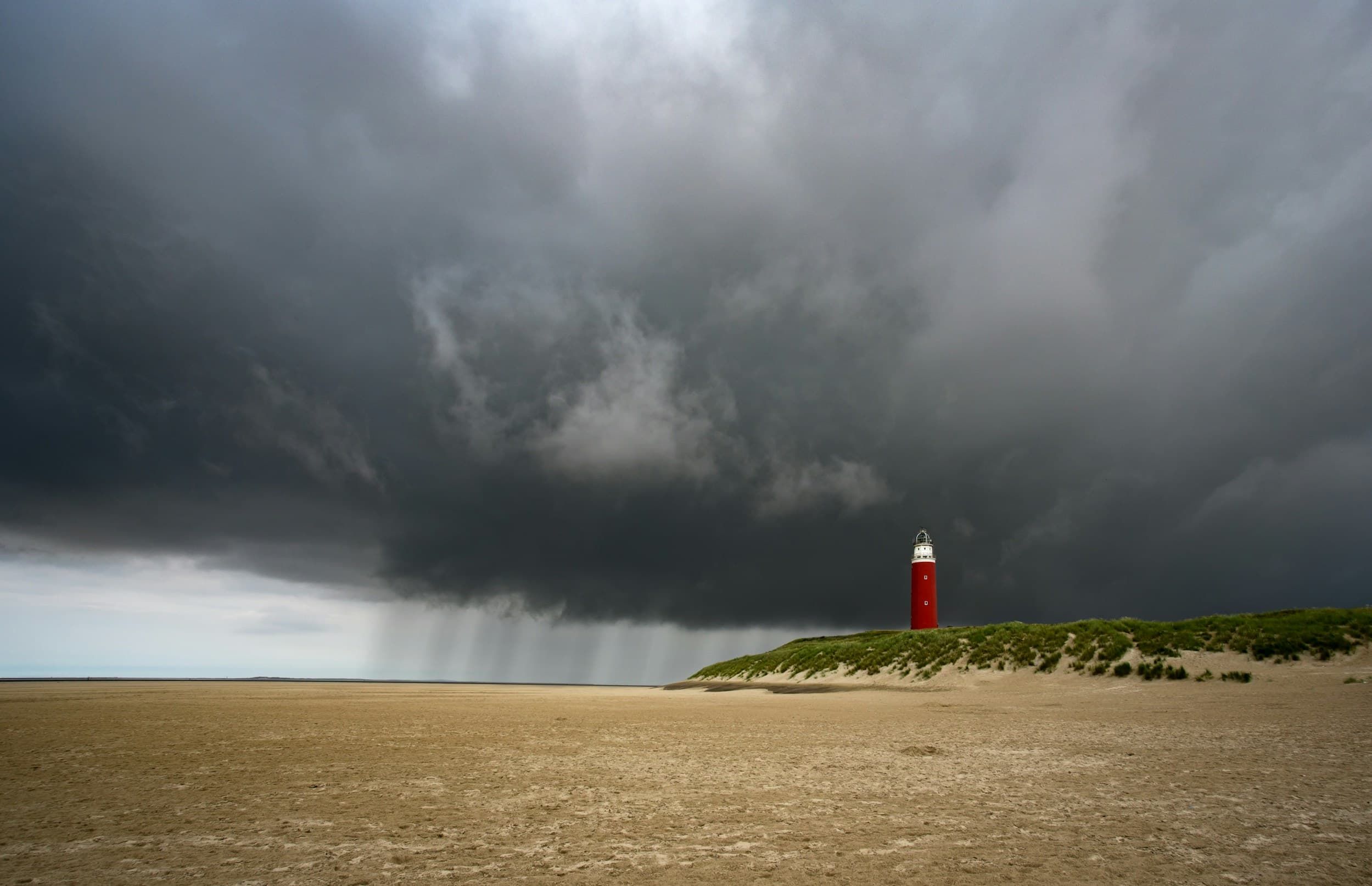 Dark storm clouds rolling in over the ocean